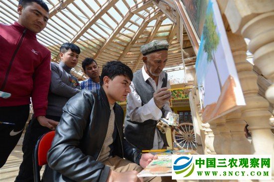(社会)(5)农民画家阿卜力克木追梦六十载